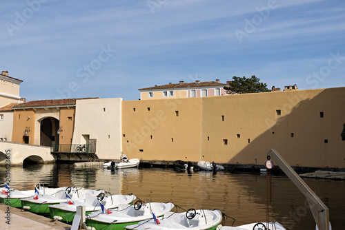Fotografie Main entrance gate of Port Grimaud in France to the city center in spring, frenc