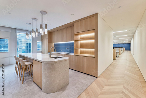 Clean restaurant and lounge interior with refined seating and warm architectural lighting