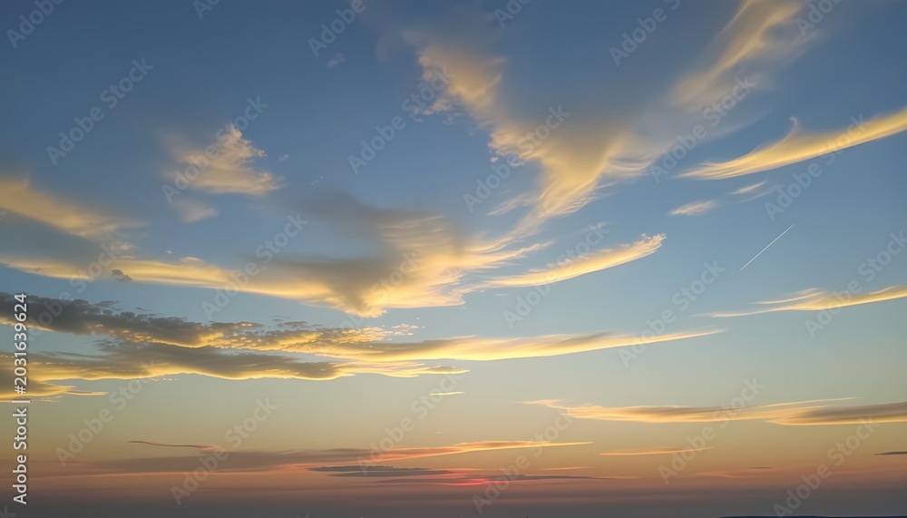 Fototapeta premium Orange and Blue Sky with Clouds