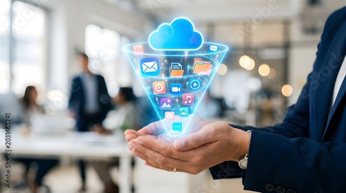 Business professional holding futuristic digital cloud with icons representing global connectivity and technology in modern office