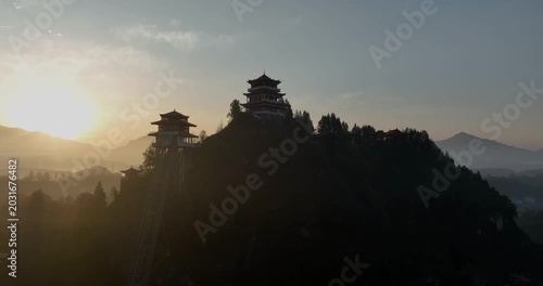 Sunrise and ancient chinese buddha temple landscape in Hunan province,China