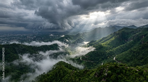 Aerial Monsoon Clouds Over Margalla Hills with Dramatic Green Mountain Landscape