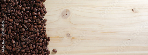 Roasted coffee beans on wood