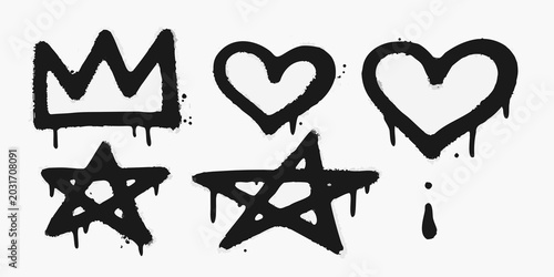 Spray paint icons of a crown hearts and stars with dripping paint on white background