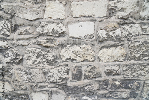 Old stone masonry wall texture background