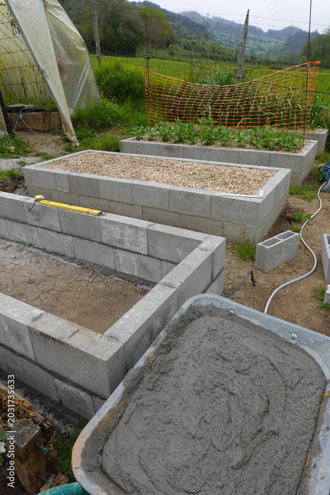 Fototapeta premium Building concrete block raised garden beds
