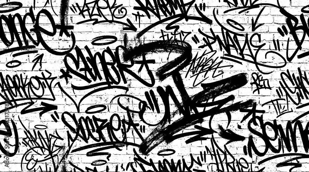 Fototapeta premium The city wall displays vibrant graffiti street art in an urban environment.