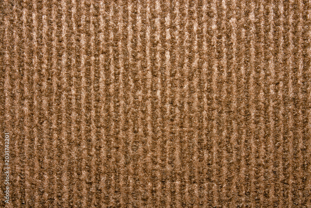 Fototapeta premium The texture is brown carpet.Self-adhesive scratching post for cats.Durable carpet for cats.