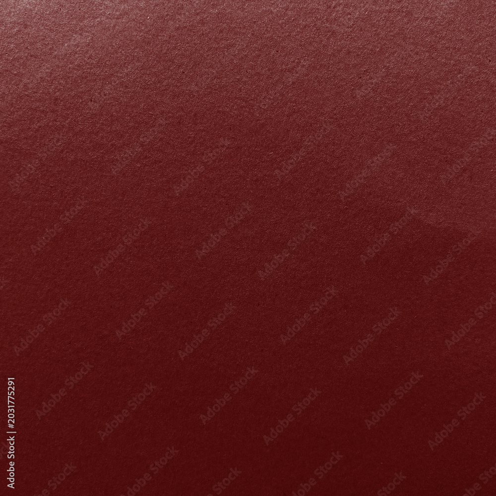 Fototapeta premium Rich maroon textured background with copy space