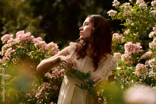 Fotografi Young woman embraces blissful moments in vibrant nature surrounded by blooming f