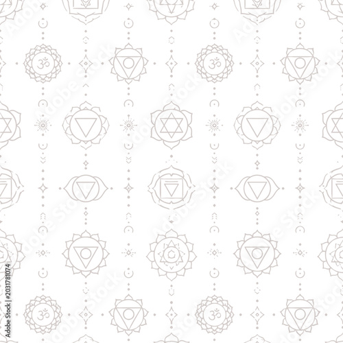 Seamless pattern with white yoga chakra symbols on black