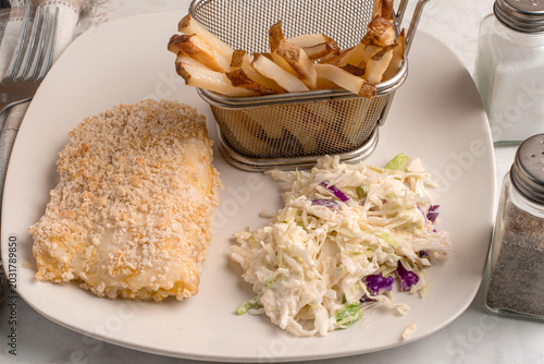 Bild auf Leinwand baked cod with  cole slaw and french fries