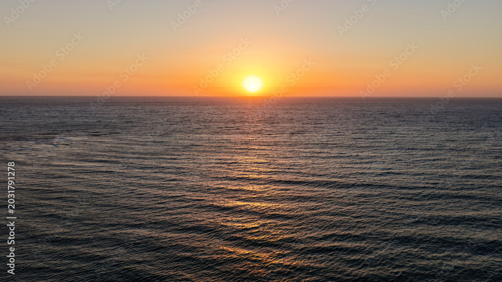 Obraz premium Port Noarlunga Beach and South Port Beach, Southern Adelaide, South Australia – 4K Aerial Drone View of Golden Sunset, Onkaparinga River Mouth, Beachfront Houses, Coastline and Ocean Views