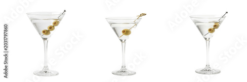 Bild auf Leinwand Elegant martini glasses with olives on picks, crystal clear cocktails arranged s