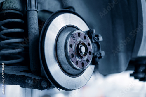 Photos Steel brake disc in car service