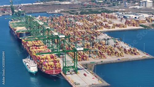 Container terminals handle cargo during shipping delays and supply chain issues