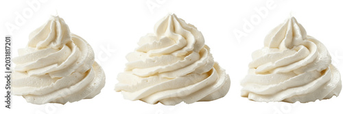 Photos Swirls of whipped cream dessert topping, fluffy creamy dollops isolated on white