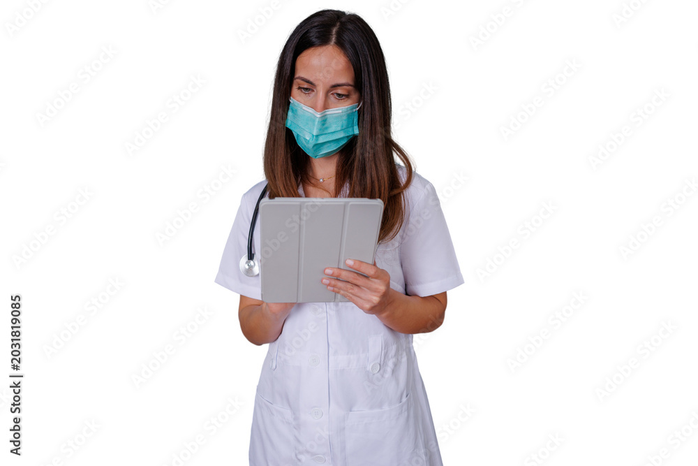 Fototapeta premium Medical professional wearing a protective face mask and a white uniform, interacting with a tablet for digital healthcare services. Transparent background
