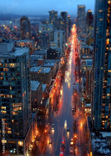Cityscape at Dusk - A Vibrant Urban Scene with Illuminated Streets.