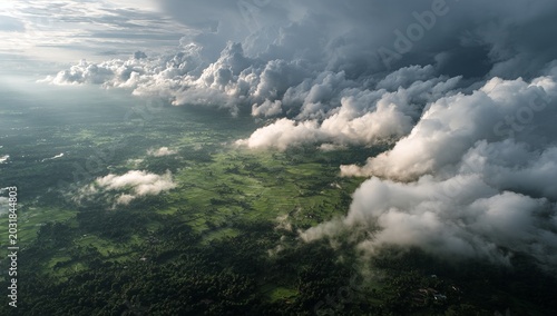 Dramatic Sky Over Lush Green Landscape - A Stormy Weather Scene.