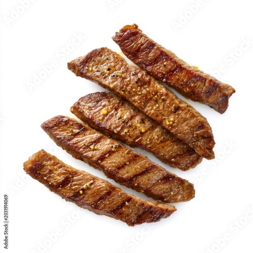 Grilled Beef Strips Perfectly Cooked with Charred Lines and Juicy Texture on White Background