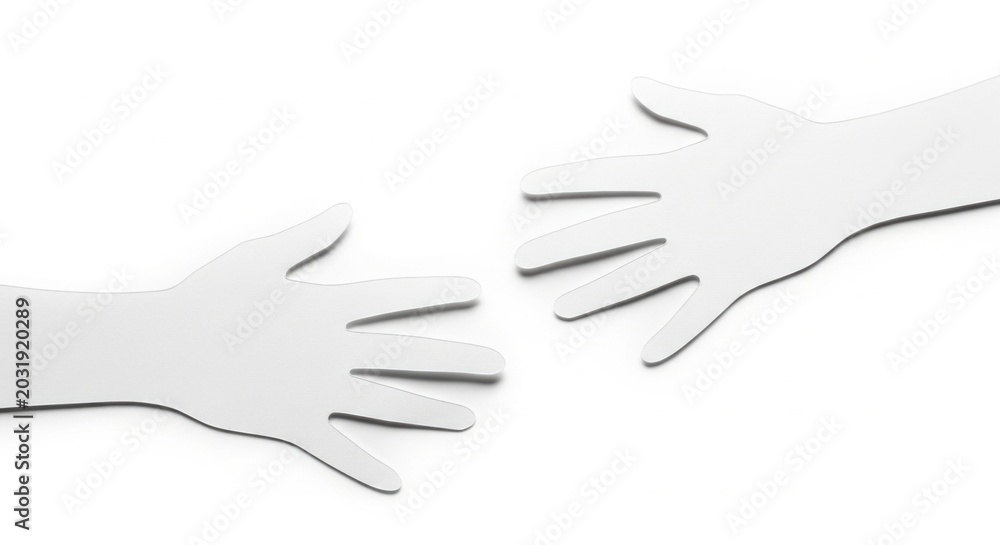 Obraz premium paper cutout hands reaching out