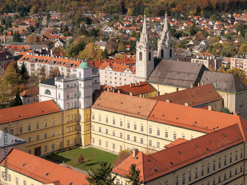 Photos Aerial view of the historic Cistercian Abbey of Zirc and the monastery buildings surrounded by fall foliage