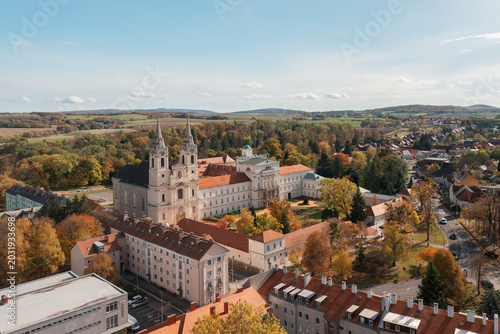 Принти на полотні Aerial view of the historic Cistercian Abbey of Zirc and the monastery buildings surrounded by fall foliage