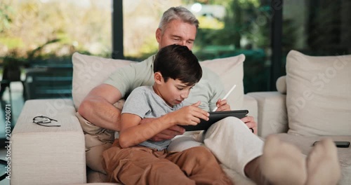 Stylus, tablet and dad with child on sofa for bonding with online games, website and digital drawing. Family, home and father with boy on tech with pen for elearning, internet and relax on weekend