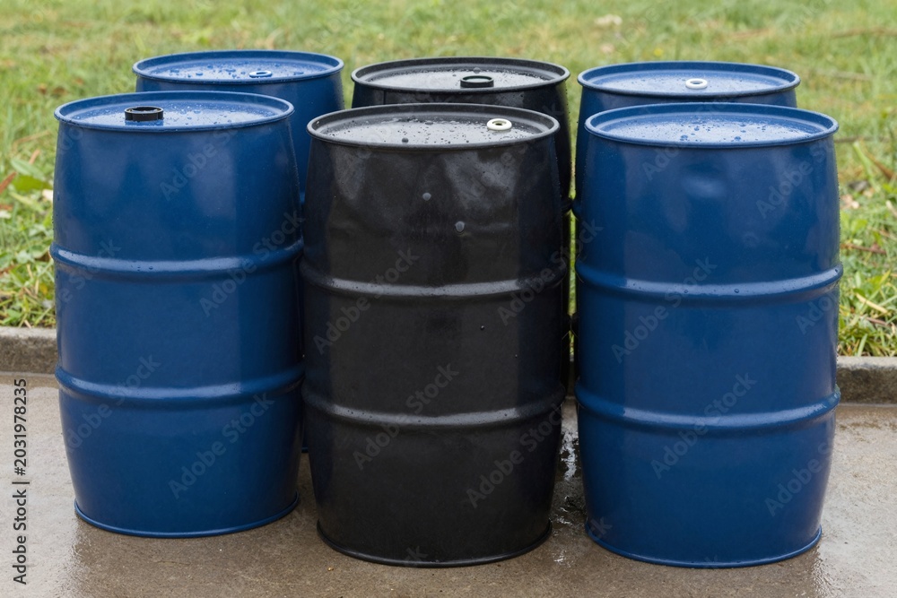 Obraz premium Stack of Barrels - Industrial Storage Solution