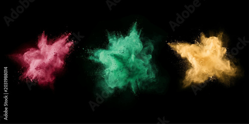Bild auf Leinwand Three vibrant bursts of colorful powder explode against a stark black background, creating a dynamic and energetic visual spectacle in shades of crimson, emerald, and gold