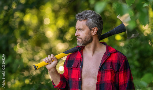 Quadro em tela Hispanic lumberjack man with axe