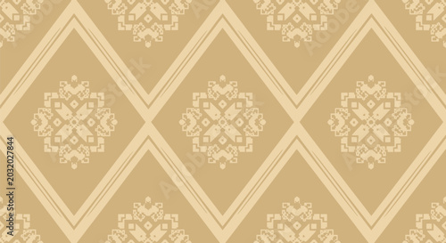 Photos Elegant beige vintage style wallpaper with repeating ornate floral diamond motifs arranged in geometric layout for classic interior decor and luxury surface