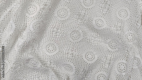 Foto Background view of an elegant white vintage crochet lace textile with intricate handmade needlework, a full frame background texture