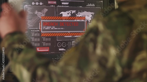 Military officer reporting threat during security breach in intelligence system