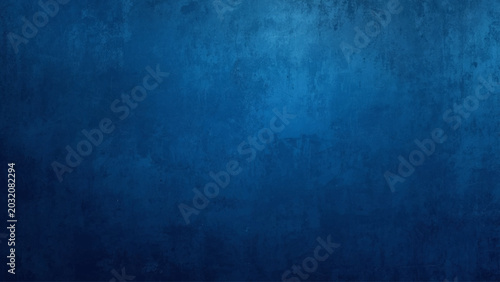 Dark blue textured background, gradient and mottled surface.