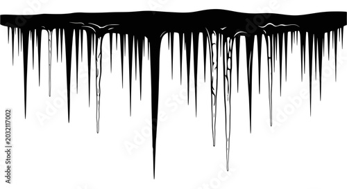 Foto Black liquid drips down from a horizontal surface creating icicle like streaks o