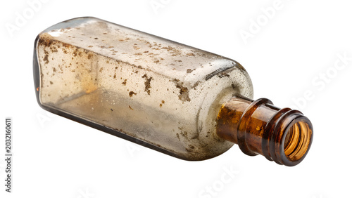 Dirty old empty glass bottle on transparent background