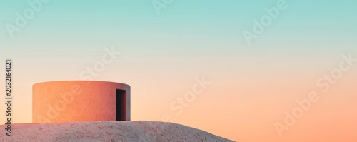 Minimalist peach cylinder with dark portal on textured dune against tranquil teal-orange gradient sky, evoking solitary serenity. Abstract, Architecture