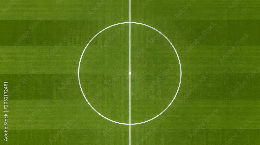 Obraz premium Top down view of a professional soccer field center circle