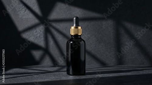 Black glass bottle with dropper cap.