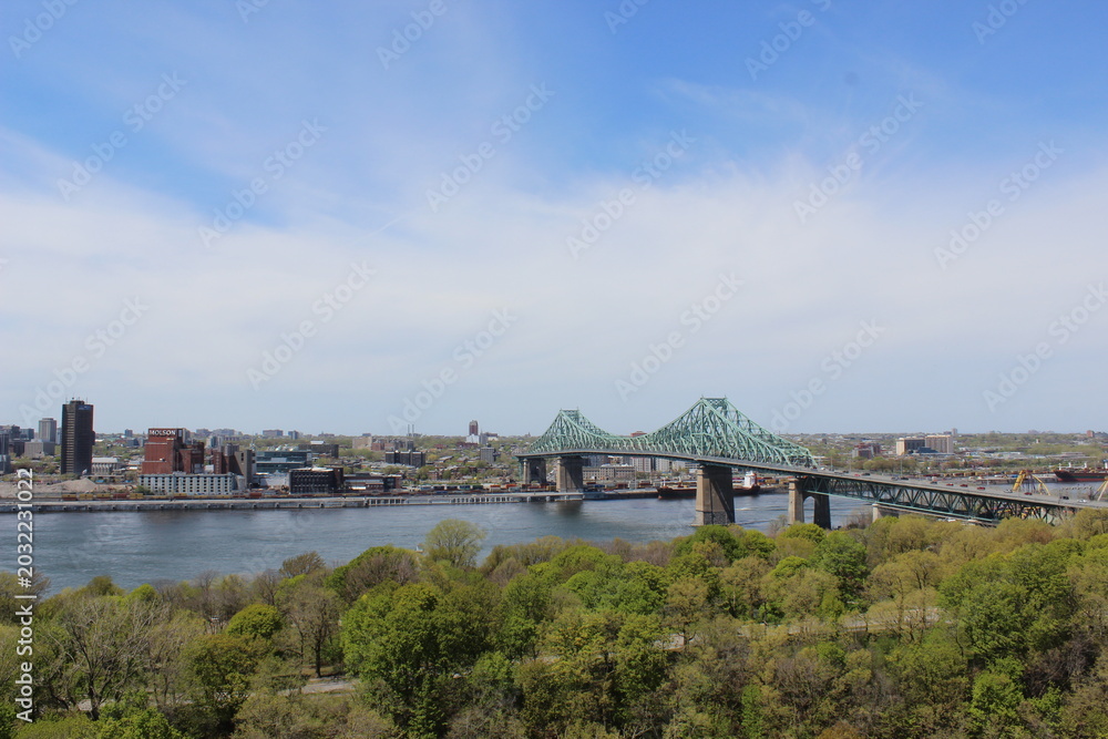 Fototapeta premium Jacques Cartier Bridge over Saint Lawrence River Montreal Quebec Canada spring