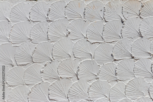 Cement wall with lotus leaf patterns at Wat Phra That Doi Kham, Chiang Mai, Thailand