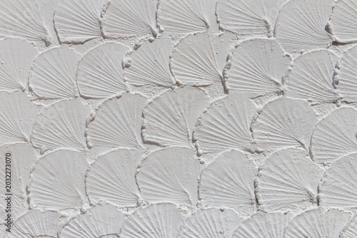 Cement wall with lotus leaf patterns at Wat Phra That Doi Kham, Chiang Mai, Thailand