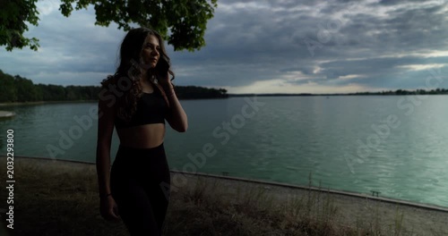 A Captivating and Serene Lakeside Reflection Captured Beautifully Against the Backdrop of Dusk