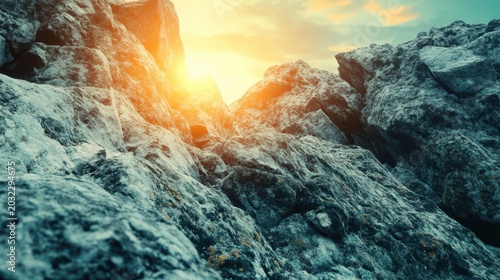 Dramatic geological mountain rock formations bathed in golden sunlight, showcasing rugged terrain and majestic landscape.