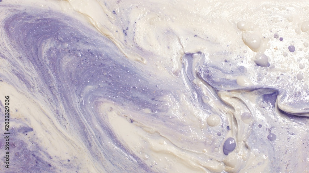 Fototapeta premium Viscous mixture of pale purple and off white pigments swirling together creating abstract texture