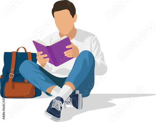 Young student sitting on floor reading a book with backpack