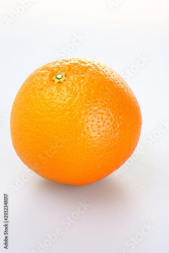 Bild auf Leinwand The fruit shown resembles a Navel orange, which is popular for being seedless and easy to peel