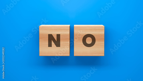 Foto Two wooden cubes showing N and O on blue background